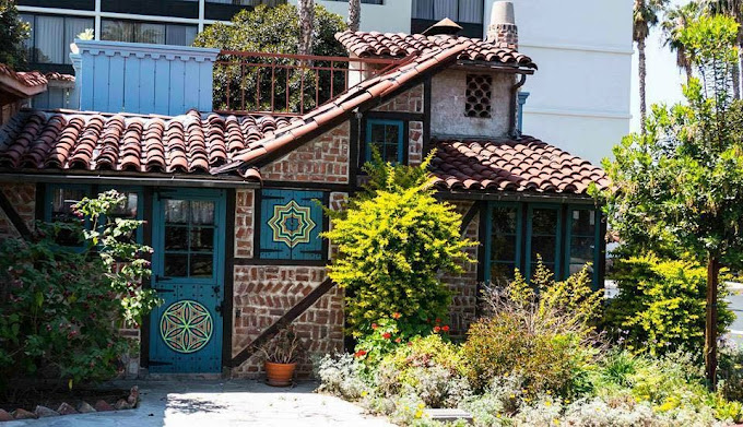 The Peter J. Weber House is a historic house and landmark in Riverside, CA. Architect Peter J. Weber built the house in the 1930s as a family home and showcase for his creative work. The eclectic house features recycled materials and finishes, ornate details, colorful  ceilings.