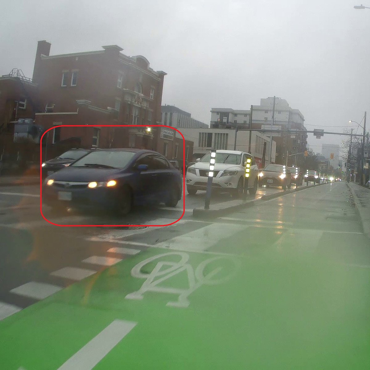 This driver is signaling a turn to go the wrong way on Catherine St. Other drivers honked, but they went and did it anyway. #autowa (rear camera didn't catch it due to spray from water on the ground).