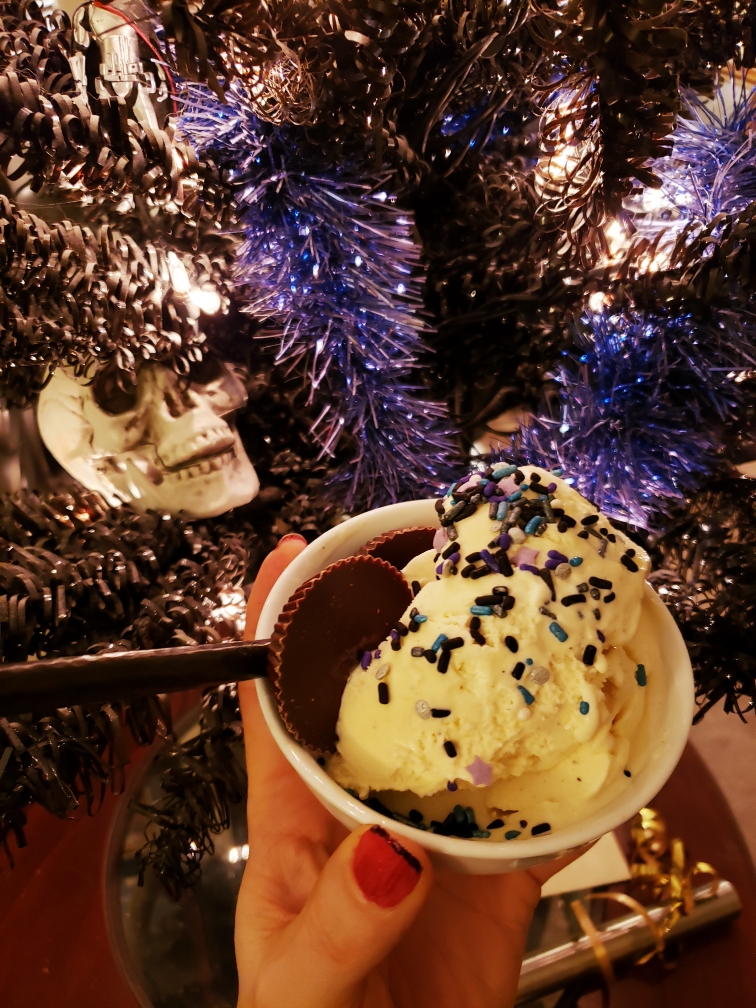 Wicked Kitchen's non-dairy vanilla ice cream houses some vegan Reese's and a heaping pile of gothy, starlight sprinkles~ :3