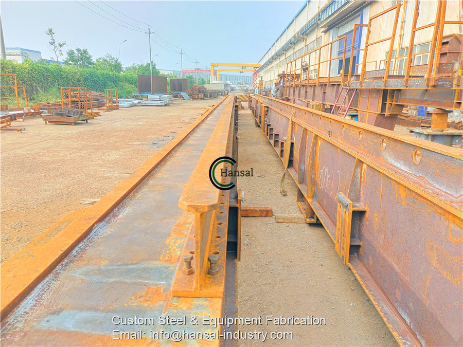 The bottom rails of the main girder trial assembly inspection are ongoing, the straightness, flatness, joint connection as well as hole CC distances have been checked and excellently satisfy the requirements.

#steelfabrication #mechanicalequipmentsteelworkfabrication