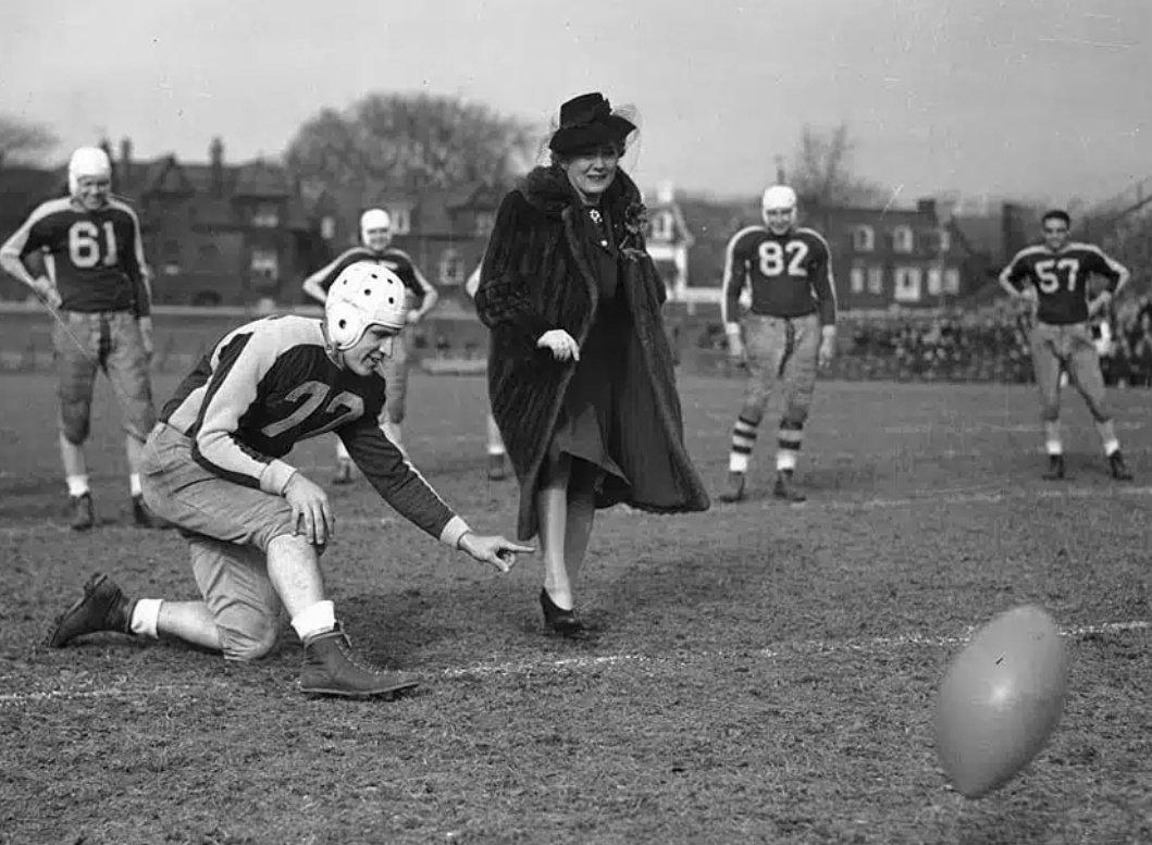 Also the most famous @TorontoArgos fan ever. Here she is handling the ceremonial kickoff at the 1940 season finale against Montreal. The holder is BILL STUKUS, 3-time Grey Cup winner and the greatest QB of his generation. Our Game. Our League. Our History.