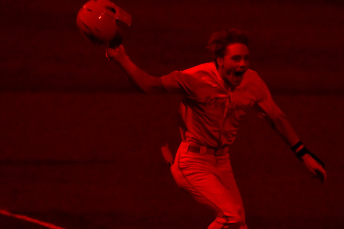 Well, the home run light show isn't great for taking photos, but you get the idea here - Brandon Butterworth was fired the heck up after crushing a 94 mph center-cut fastball from Matt Poston over the LF wall. @NCStateBaseball walks off UNC 9-8. Highly entertaining ballgame.