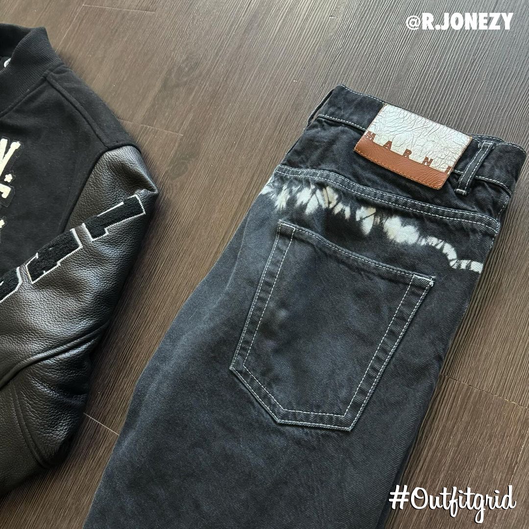 Today's top #outfitgrid is by @r.jonezy. ▫️ #Pleasures x #NERD #VarsityJacket ▫️ #Marni #Denim ▫️ #AilealiMay x #JordanI