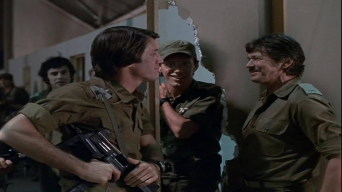 Hoosiers1986's tweet photo. @JbrVet @RealJamesWoods @SierraWhiskee My favorite actor of all time is Charles Bronson. Here is @RealJamesWoods &amp; Charles sharing some screen time in the emmy winning tv event #RAIDONENTEBBE! #JamesWoodsDay https://t.co/uYq4BJ7nB8