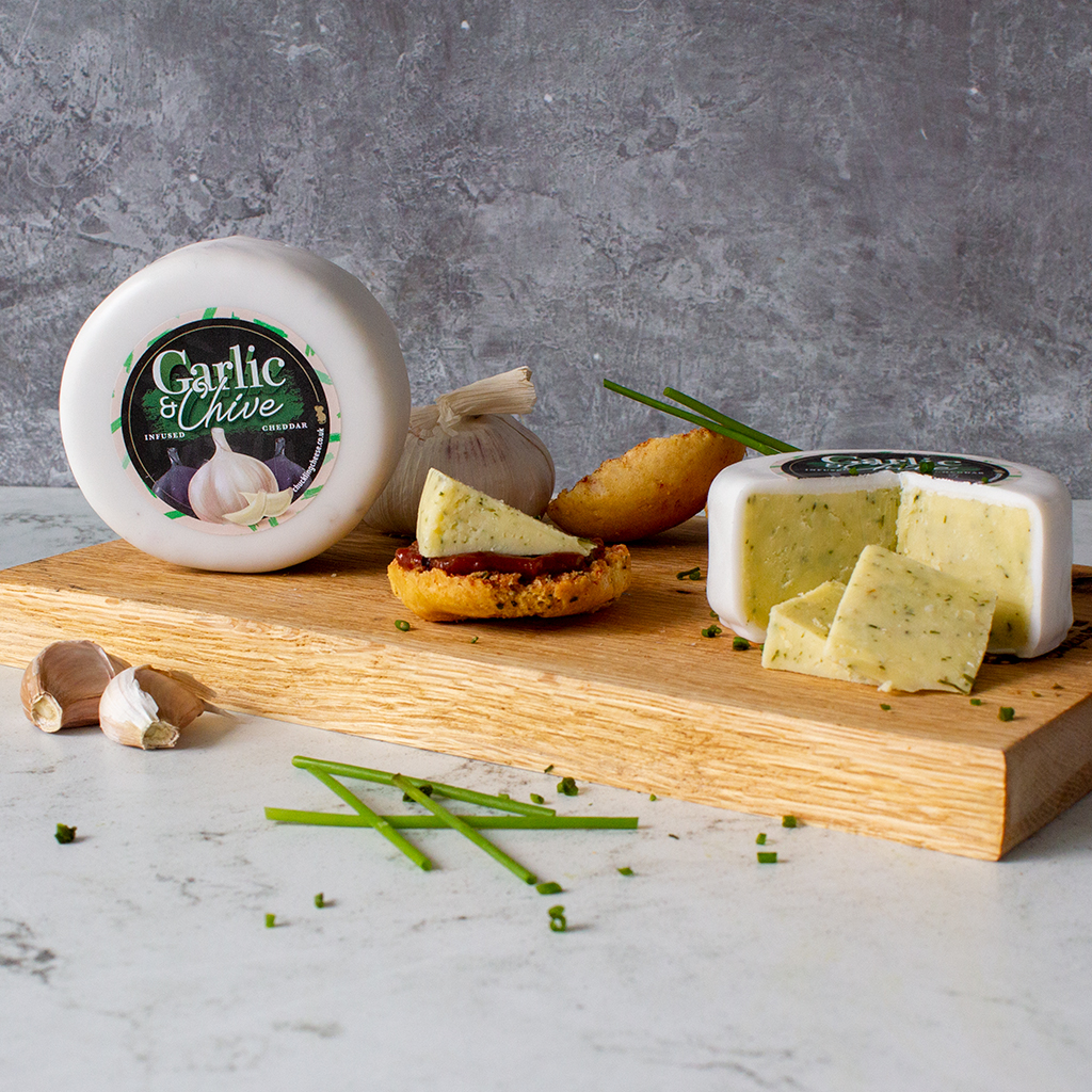 💚The Garlic & Chive Cheddar Truckle💚 Shop here: zurl.co/o2uX Perfect to devour this National Garlic Day, why not try it baked on your next lasagna or topped on a hearty garlic bread for added flavour?😍 #chucklingcheese #notjustcheese