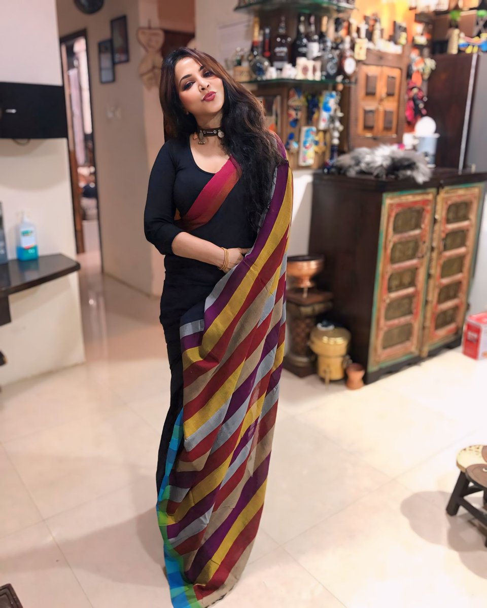 In a sea of colours, a black saree is my guiding star.