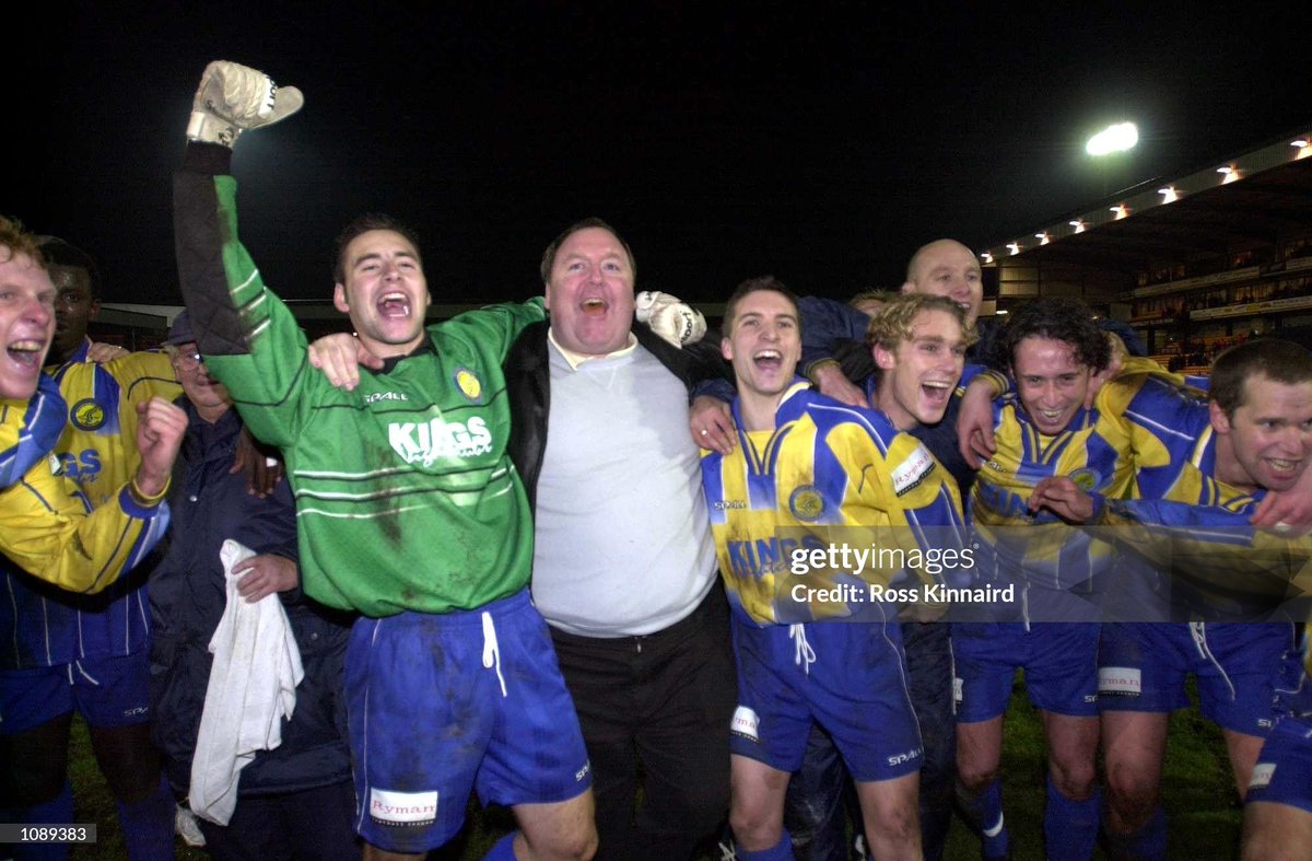 Jeff King and his Canvey Island team after their win in the FA Cup first round replay between Port Vale and Canvey Island at the Vale Park ground, Stoke on Trent, England. (2000)