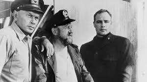 merlinpapin3's tweet photo. .@FredOL69007 .@tbarnaud #DéfiCinéClassiques2024(Marlon Brando )  Vu le film (découverte)  #Morituri de Bernhardt Wicki (1965) avec Marlon Brando Yul Brynner Janet Margolin Trevor Howard Wally Cox Hans Christian Blech Martin Brandt Martin Kosleck William Redfield Eric Braden Georges Takei

Robert Crain, officier déserteur de la Wehrmacht, a été recruté de force par les Alliés. Sous une fausse identité, il embarque à Tokyo sur un cargo allemand. Afin d'éviter que la cargaison de caoutchouc qu'il transporte ne tombe aux mains de l'ennemi, l'équipage a reçu l'ordre de se saborder en cas d'attaque. La mission de l'agent infiltré est de les empêcher de couler le navire.

J’ai bien aimé ce film, une sorte de film d’espionnage pendant la dernière guerre avec cet officier joué parfaitement par Brando ou tour à tour il devra affronter sa hiérarchie de circonstances, obtenir la confiance d’autres et surtout de l’équipage et d’essayer de sauver sans se révéler une jeune fille juive

Malgré un presque huis-clos sur un bateau pas de scène de mer, et comme j’ai vu le film en VF le doublage avec l’accent allemand est ridicule, mais le reste va bien, un bon suspens avec le soin à une intéressante mise en scène
