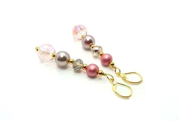 These Sweet Pink Champagne Earrings are just stunning by #DesignedbyAudrey. They are #handmade with love, these Pink Blush Crystal and Pearl Earrings are the perfect accessory for any woman. Shop now on Etsy! buff.ly/3UeEFVP via @Etsy #jewelry #fashion'