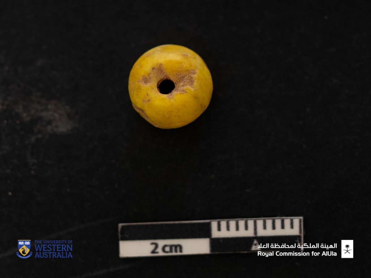 Help! This small bead was found in a structure that dates anywhere from 1800-200 BCE. This bright yellow bead is of a type we have never seen before. What is it made from? Is it local or from further afield, like Egypt? We would welcome anyone to contact us who has found similar.