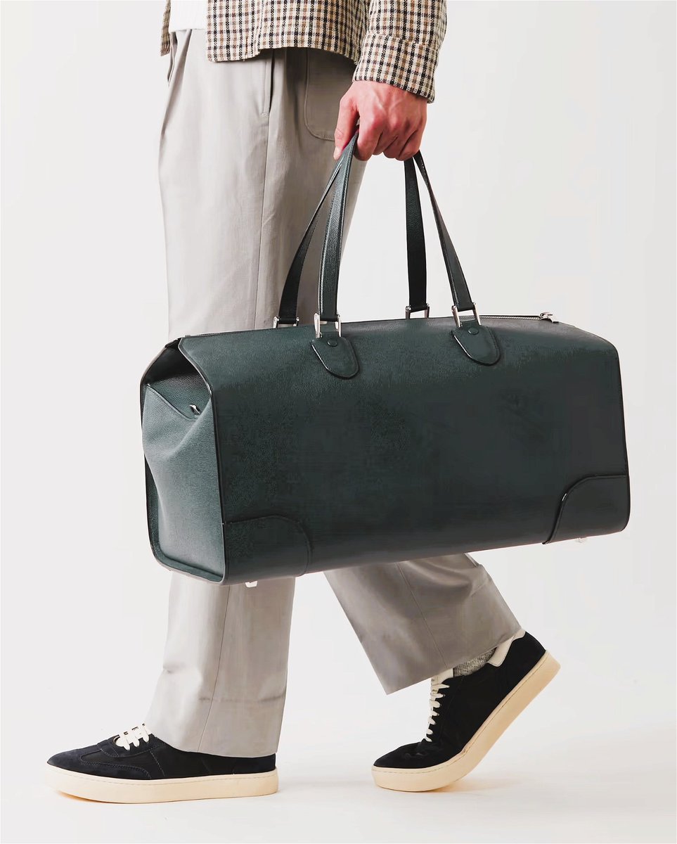 Embark on your travels with the epitome of timeless design – Valextra's 'Boston' pebble-grain leather duffle bag.
#ValextraBoston #TimelessTravel #EleganceOnTheGo #kidsaccessories #luxuryaccessories #leatheraccessories #bag #bags #BagObsession #CarryAllDay