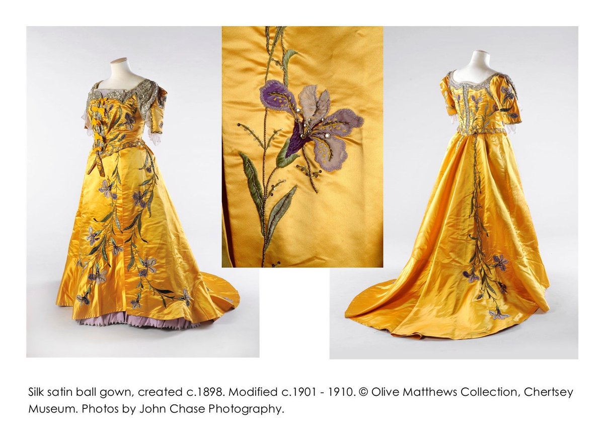 #FridayFrocks - #SpringFlowers: a satin ball gown c.1898 with later alterations. Hand embroidered irises are stitched in chenille with beadwork, sequins, applied chiffon and velvet. Note the glass paste ‘dewdrops’ on the petals. @johnchasephoto