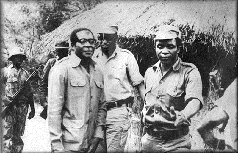 This unique heritage photo shows the founding President of Zimbabwe Robert Mugabe (left) in Mozambique during the liberation war, with the ZANLA Commander Gen Josiah Tongogara (centre) & the first trained guerrilla to enter the country, Emmerson Dambudzo Mnangagwa, now President.