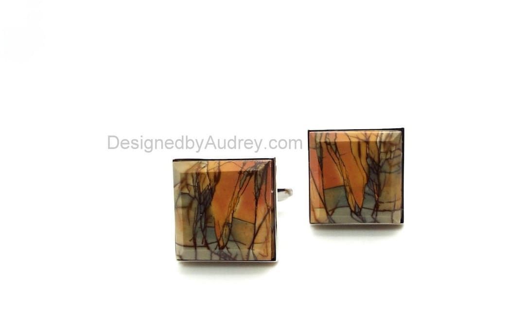 See the beauty of nature with these colorful Picasso jasper cufflinks by #DesignedbyAudrey. Features shades of orange, golden yellow, and green creating an artsy landscape that will make the perfect gift for lovers of colorful accessories. buff.ly/3UeGRfY