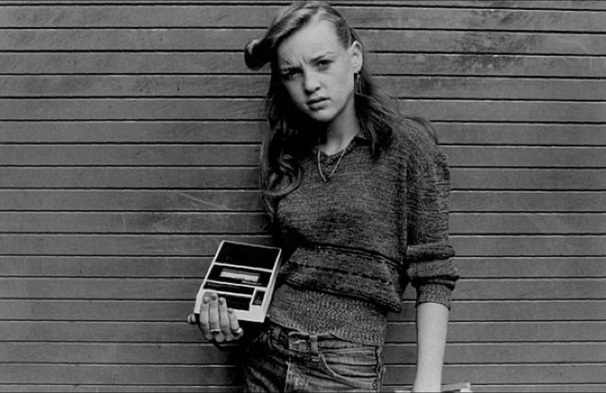 Young woman with her cassette recorder, London 1975. Photographer Al Vandenberg.