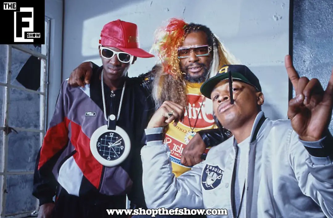 Travel back to the era when @FlavorFlav, @funkentelechy_, and @MrChuckD ruled the #music scene with #PublicEnemy. Picture Flavor Flav's clock chain, George Clinton's #funkadelic flair, and Chuck D's powerful presence. Together, they're #FashionIcons and #HipHopLegends! 🎤✨