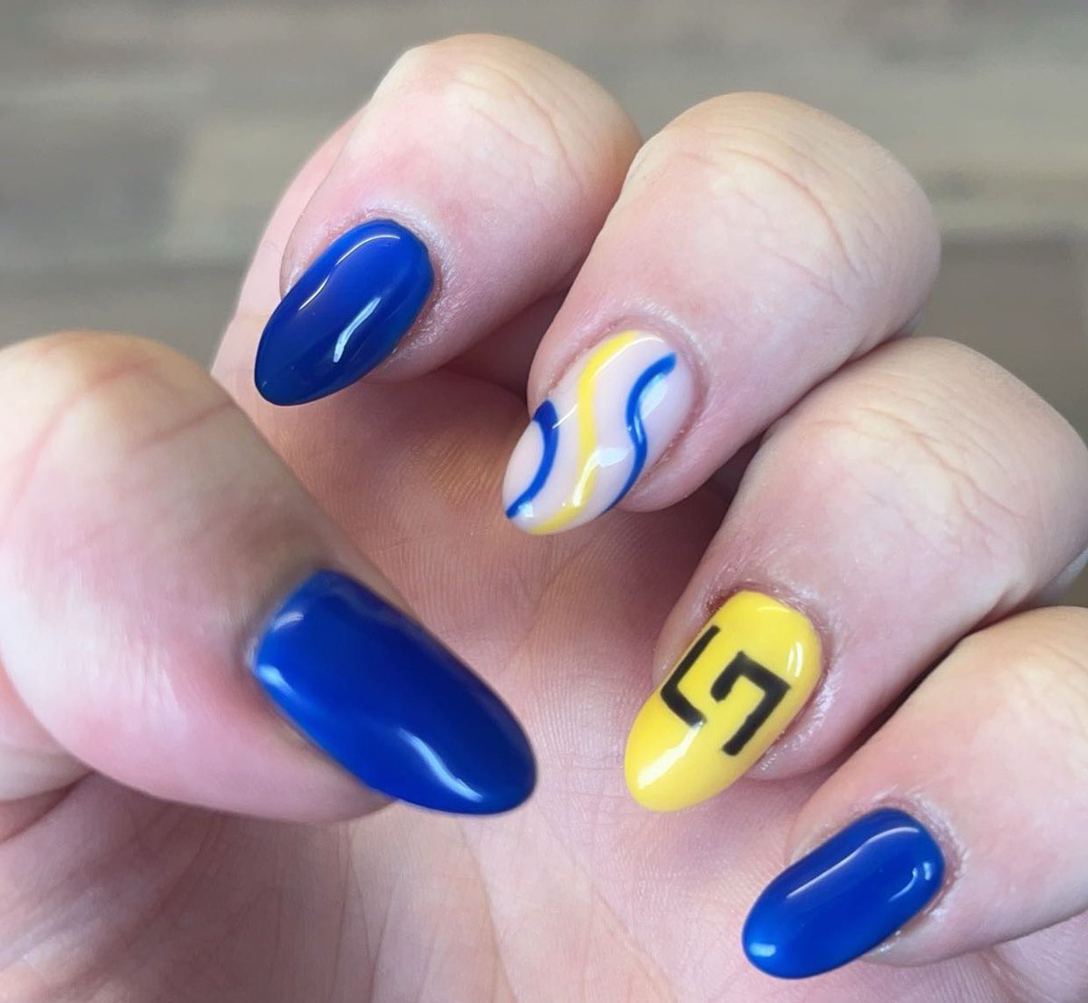 Miadevlin5's tweet photo. @LN4 what’s your thoughts on my lando nails to manifest a win https://t.co/Huph9Nwhb4