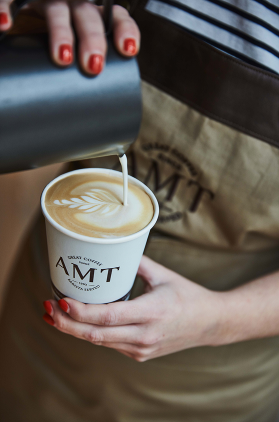 Who else can't get enough of latte art? 🎨 Our amazing baristas are the creative geniuses behind each cup, infusing it with their unique flair! #AMTcoffee #LatteArtLove ☕️