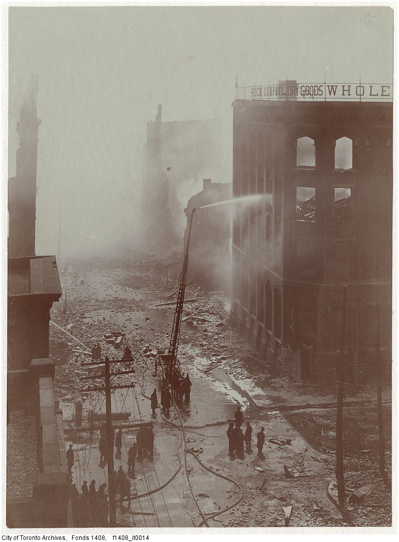 #OnThisDay 120 years ago, a massive fire destroyed a large part of Toronto's downtown. In this photo of the aftermath, fire crews man a hose aimed at the W.R. Brock Co. building at Bay & Wellington Streets. ow.ly/It3W50RflXa #TFS #OTD #TOHistory