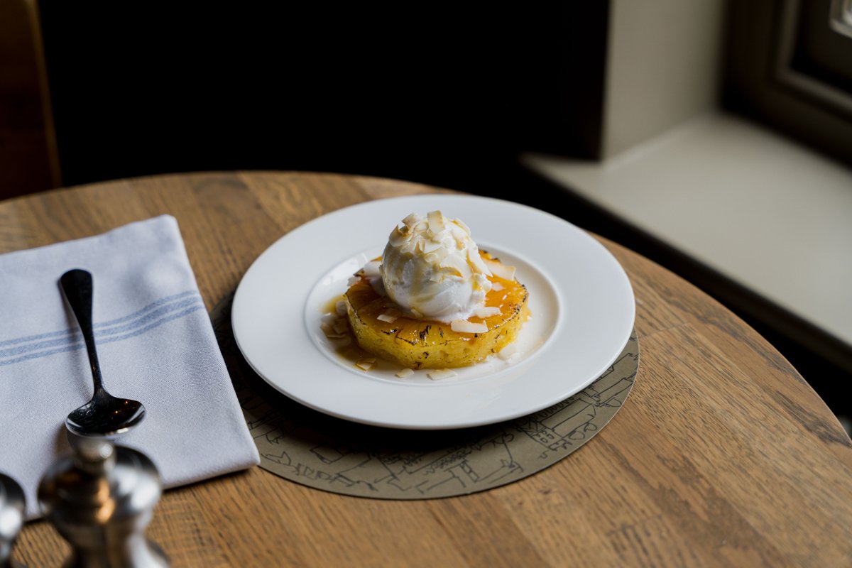 'Just... yum!' 🍍 It's a generous slice of pineapple, with the caramelised top layer adding a little crunch to its sticky, juicy goodness... Plus, the coconut sorbet, is creamy and delicious. So many textures! It's the type of dish you'll want all for yourself...