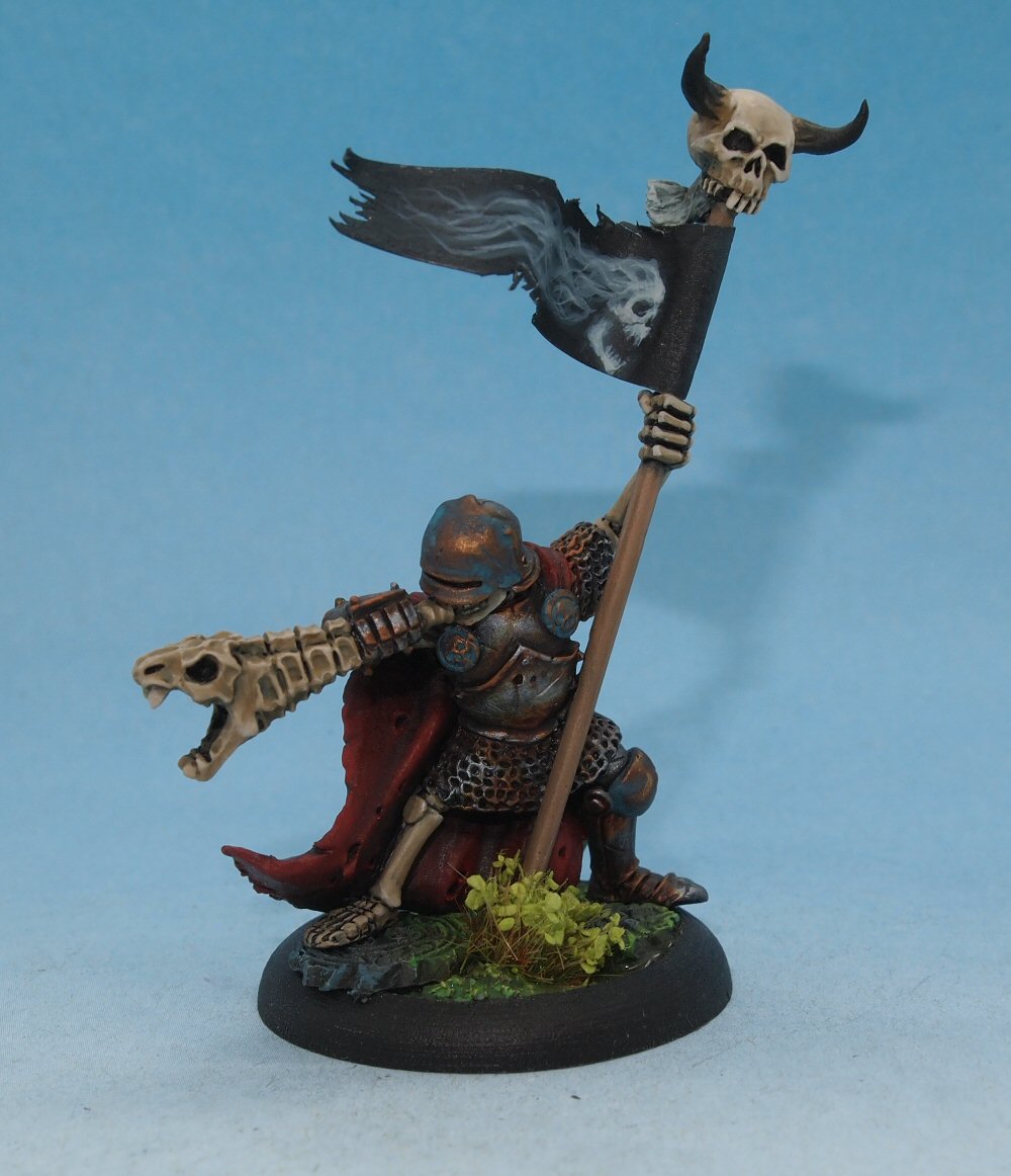 Tim_Prow's tweet image. Joramun the standard bearer was missing a design on his banner, I'd had an idea for a while putting a screaming skull with flowing hair so when I had the chance the other night I quickly added the design, I think it works really well and fits the banner perfectly!