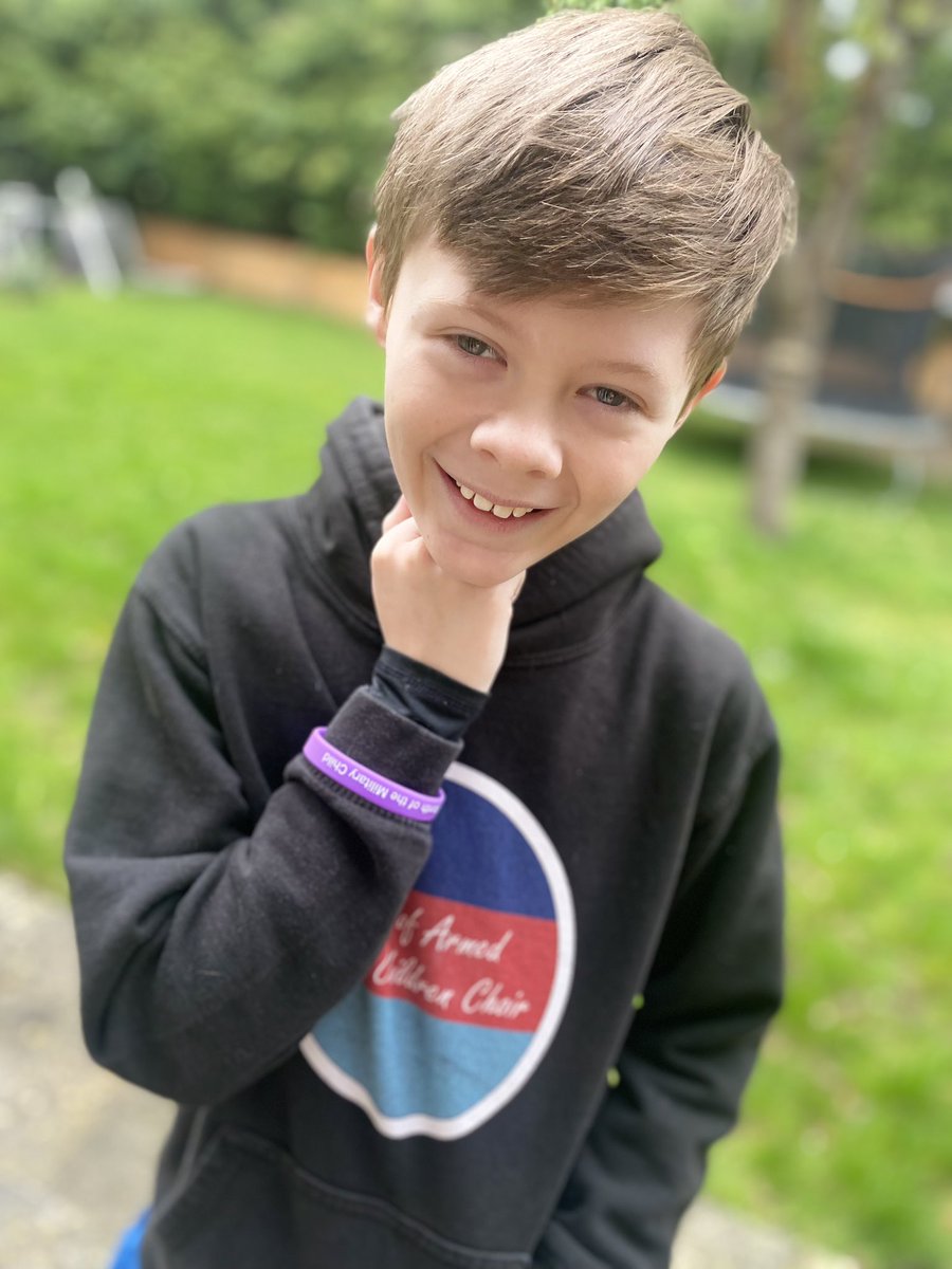 My son wearing his #MotMC purple band & @voafcc merch with pride for Purple Up Day at school today. 

April is the time to shine a spotlight on children from our Armed Forces. 

#MonthOfTheMilitaryChild 
@NevSuch @RAF_FF @ForcesEmploy