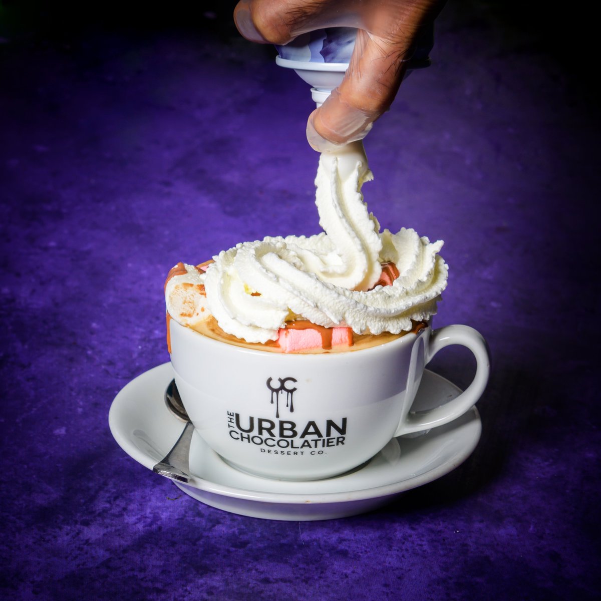 Indulge in the ultimate comfort with our signature drink, The Urban Hot Chocolate, at Urban Chocolatier! ☕🍫 Warm, creamy, and irresistibly rich, it's the perfect treat to warm you up on chilly days. Come and experience chocolatey bliss today! #UrbanChocolatier #HotChocolate