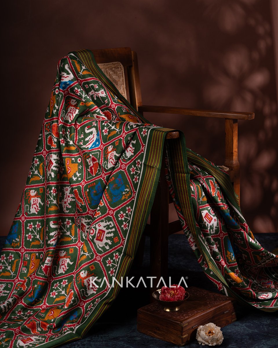 A canvas of artistry and elegance, this Green Patan Patola Silk Double Ikat saree is a testament to the timeless beauty of tradition and craftsmanship. #patanpatola #patanpatolasaree #patolasilk #patanpatolabykankatala #saree #queenofsaree #sareefashion #sareelove #handloomsilk