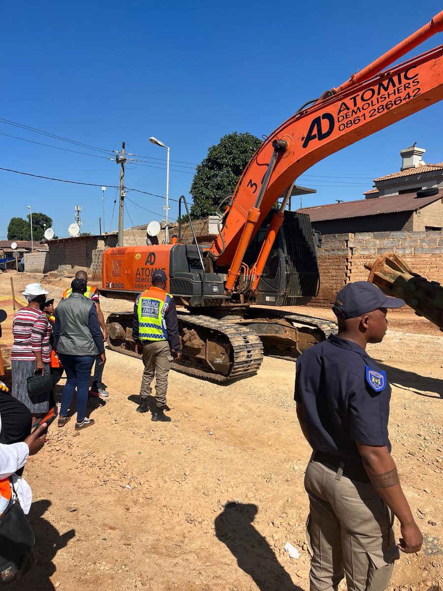 Started the day with the demolition of a wall and back rooms in a house in Ivory Park which was built on a stormwater servitude. Let's build responsibly, with permits and plans. #IvoryPark #CityRegulations #CommunityAppeal #RegionA #UrbanPlanning #LawEnforcement #WeServeJoburg