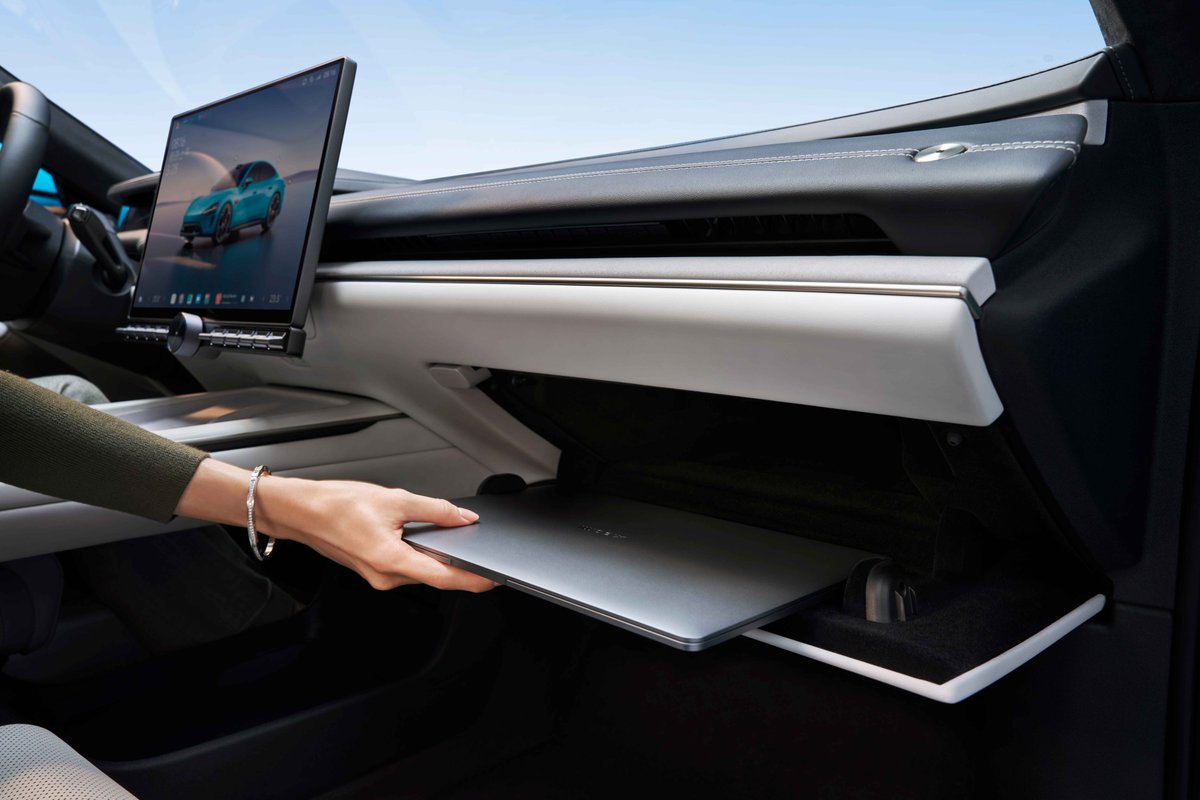 We made the glove box spacious enough to easily fit a 14-inch laptop. A design of elegance and productivity, all rolled into #XiaomiSU7.