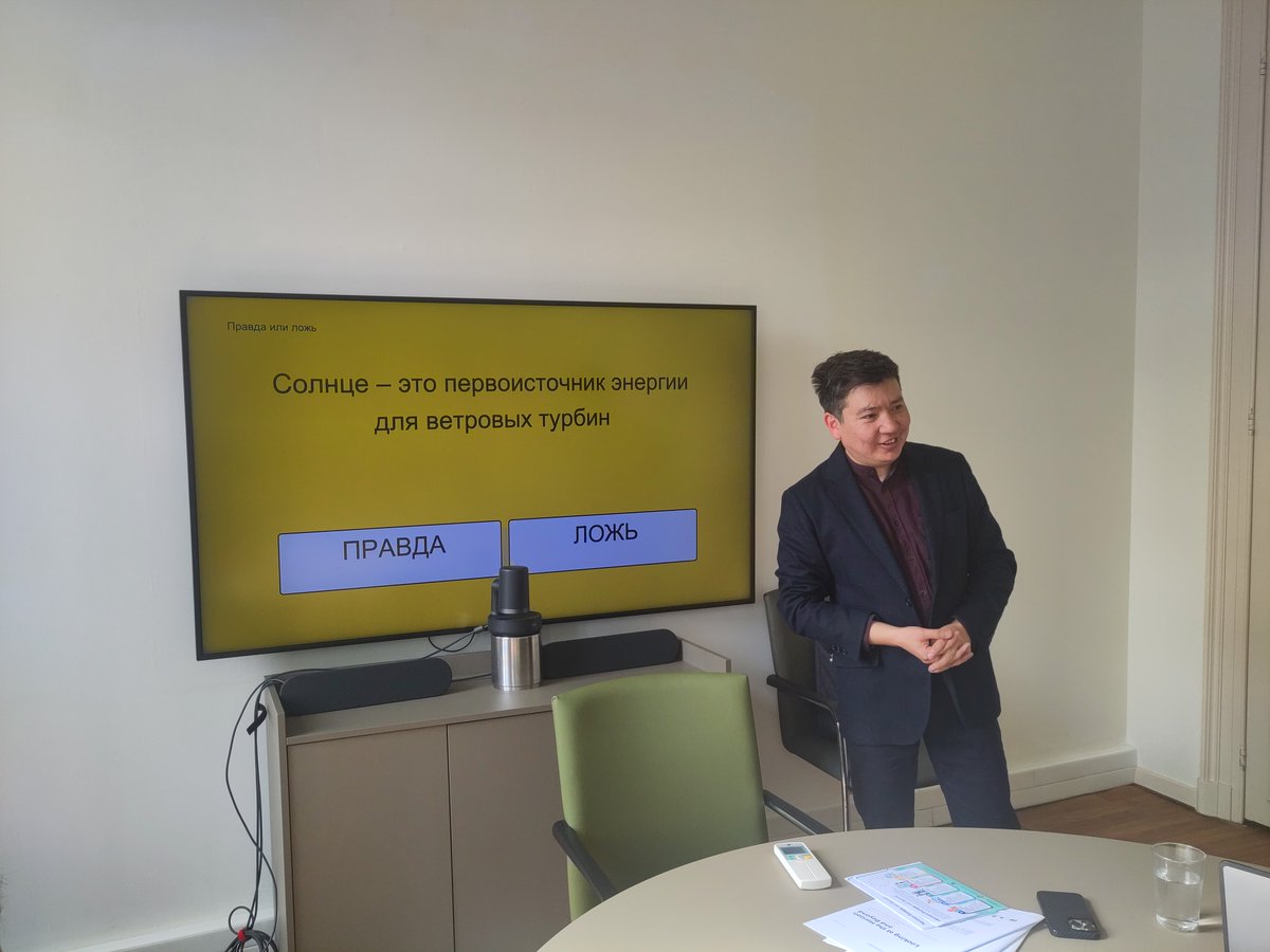 SPCE_Hub's tweet photo. Dr Abylaikhan Soltanayev (AUES Almaty) and Taalaibek Mederov (KSTU Bishkek) kicked off their brilliant presentation on technological innovation in renewable energy with an entertaining quiz. #livinglabtraining2024 https://t.co/z7GDOBPYyD