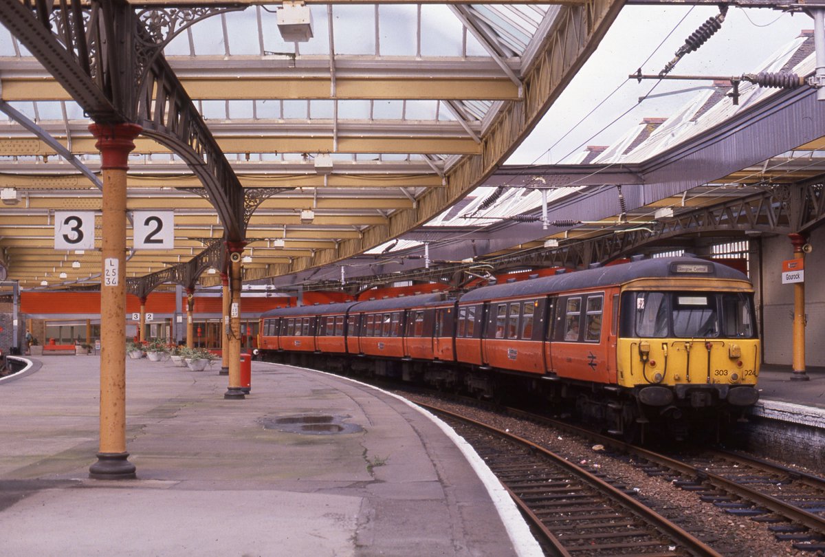 Flashback Friday: Once the backbone of Glasgow's electric suburban services, in Strathclyde PTE livery, 303024 sits at Gourock waiting to return to Glasgow Central back in 1994.
