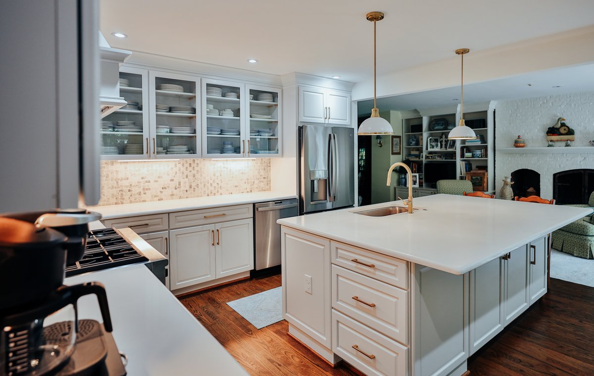 Where memories simmer and families unite—this is the heart of a home. Our team at Kitchen and Bath Shop has transformed this space into a blend of classic charm and modern function. Ready to cook up some change in your own space? Let's chat! #KitchenTransformation #HeartOfTheHome