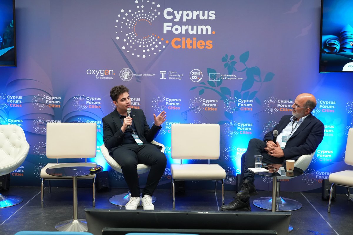 Now on the stage of #CyprusForumCities: 👉 Christos Parmakkis in conversation with @YiannisArmeftis