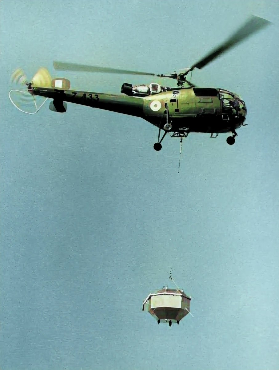 #ThisDayThatYear India launched its first satellite #Aryabhatta on 19 Apr 1975. The undated photograph shows IAF's tryst with India's Space Program, where a Chetak Helicopter is seen lifting the satellite for trials. @isro #Gaganyaan