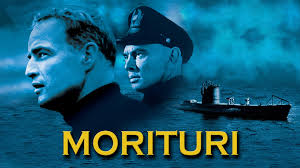 merlinpapin3's tweet photo. .@FredOL69007 #AnecdoteCinéma sur le film #Morituri , Brando a d'abord refusé de partir en tournée pour rencontrer la presse et promouvoir le film. Le studio l'a menacé, car il était contractuellement tenu de promouvoir le film, alors Brando a fait une apparition lors d'une conférence de presse. Il a déclaré à la presse : « Vous ne pourrez pas avancer dans la vie à moins de voir Morituri. » Le studio l'a dispensé de toute nouvelle apparition dans la presse après cette déclaration sarcastique.

Au départ, Trevor Howard était réticent à l'idée de travailler à nouveau aux côtés de Marlon Brando, suite à leur relation tendue lors du tournage de « Mutiny on the Bounty » (1962). Cependant, comme Howard n'avait qu'une seule apparition dans une scène, il a finalement accepté

Esther, jouée par Janet Margolin, utilise le nom de famille Goddard au lieu de son propre nom de famille Levy afin de cacher son appartenance ethnique juive. Cela reflète la situation réelle de l’actrice hollywoodienne Paulette Goddard, qui a changé son nom de Marion Levy afin de minimiser sa propre ethnie juive.

Le colonel Statter regarde un tableau dans la maison de Crain et Crain lui dit que c'est un Kirchner. Ernst Ludwig Kirchner était un peintre allemand et l'un des fondateurs de Die Brücke (« Le Pont »), une avant-garde influente des peintres expressionnistes. Dans les années 1930, son art a été qualifié de « dégénéré » par les nazis et nombre de ses peintures ont été détruites. En 1938, il se suicide.