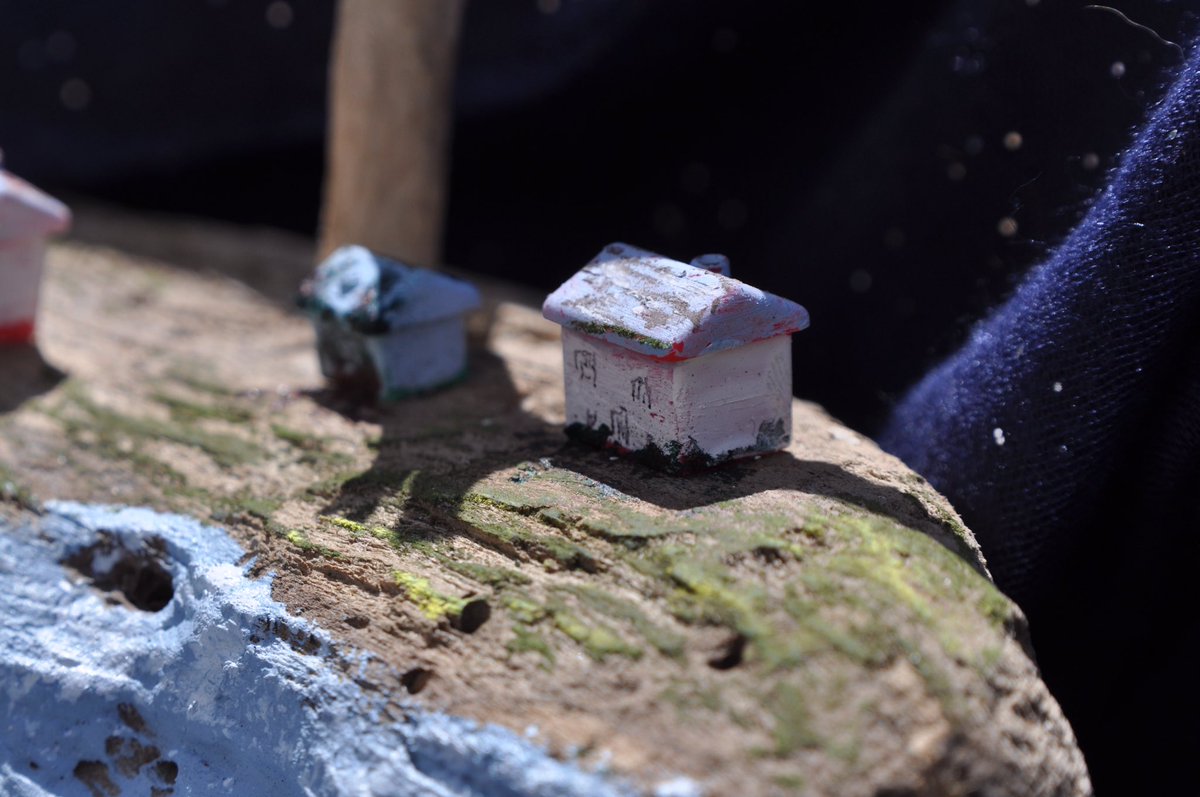 Decided to have a bit of fun with this - driftwood and monopoly houses., Called it “living on the edge”
