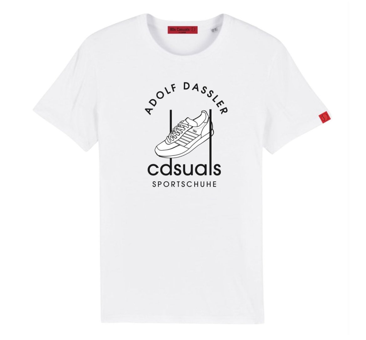 The master of the adidas Sportschuhe combined with the Casual Sub-Culture changed the High Street forever. Here is our homage to Adolph Dassler with a re-invention of the brands 1949 logo. White T-Shirt available up to 4xl with Navy up to 5XL. And as we’re still celebrating 20…