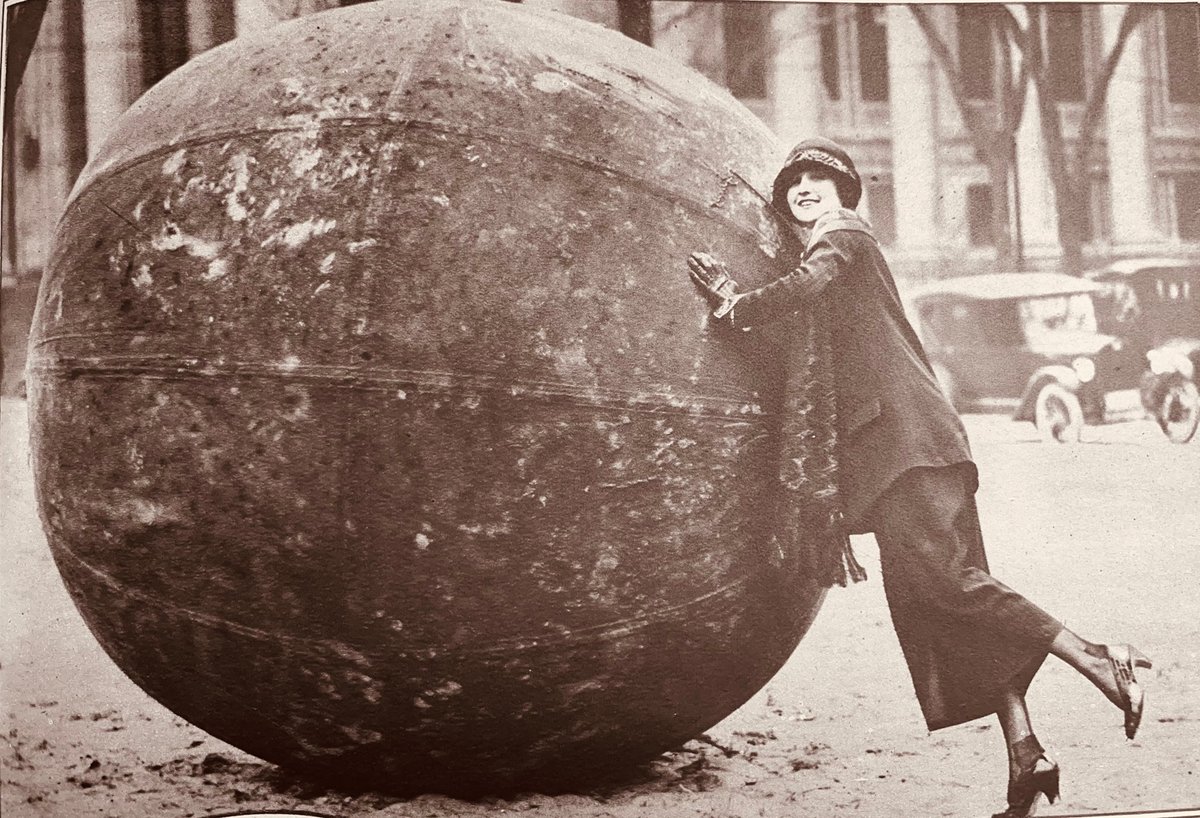 April 19, 1924: Maxine Brown, the 'little colonel' of the 6th New York Infantry, rolls the world's largest baseball into Albany. She is on a tour of the state to promote citizens' training camps for military preparedness in Plattsburgh.