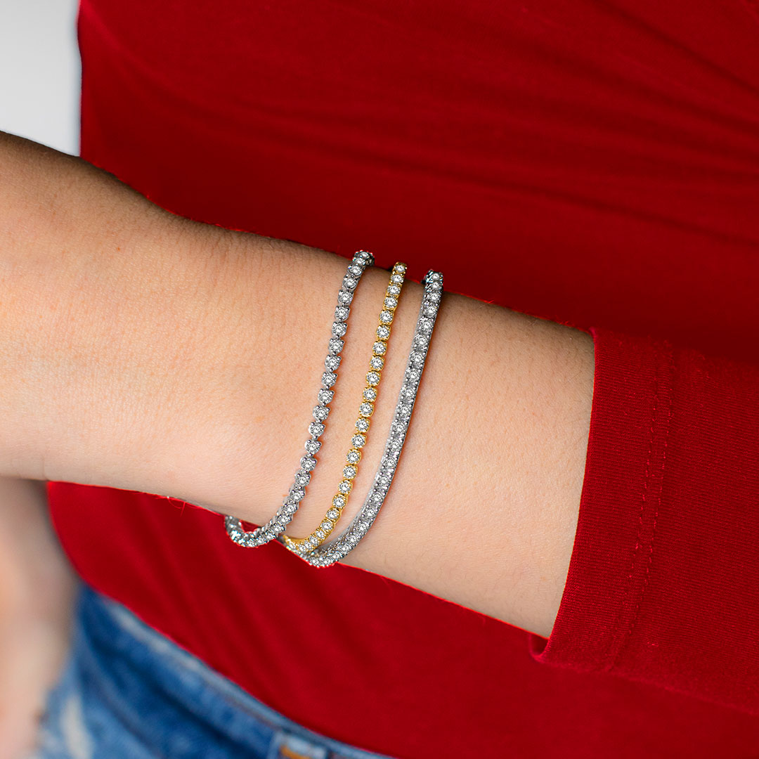 Stack up on style with these sleek and sparkling tennis bracelets. A blend of classic and modern charm to take your wrist game to the next level! ❤️💫 #StackingStyle #WristCandy #DiamondBracelets #FashionStatement #MixAndMatch #AccessorizeWithElegance #ASHI