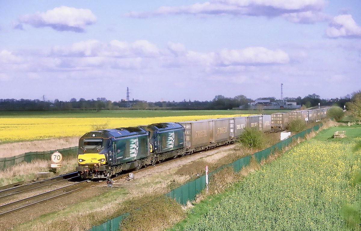 pacorrie's tweet image. I’m a bit miffed composition with this a few weeks ago slide No36 I’ve pressed the shutter too early around a second id of liked it to cover the speed board 68008+68009 Hambelton Jn 4Z44 11:29 Daventry-Coatbridge 30/03/24 (at speed) #drs #hambelton #class68 #tesco @DRSgovuk