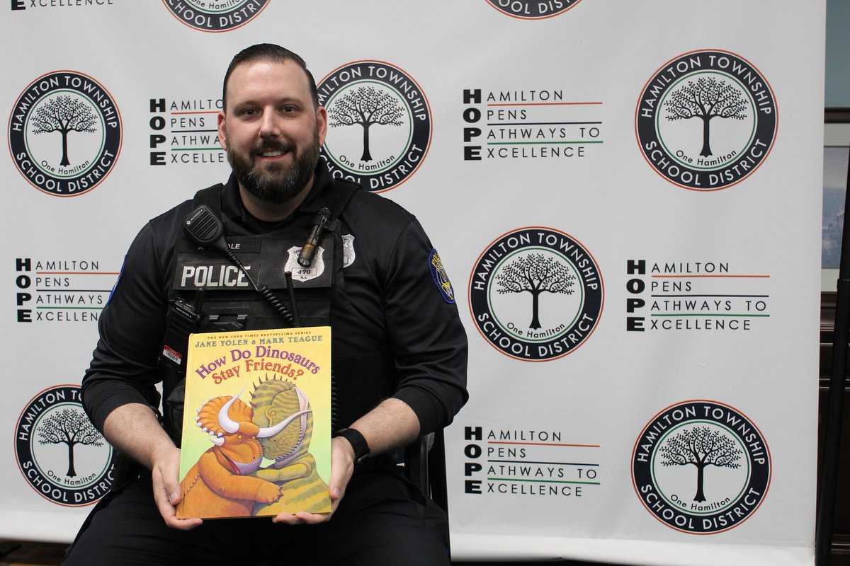 April 9th Autism Acceptance Read Aloud Day at HTSD! HHW School Resource Officer (SRO), Officer Carvale, read 'How Do Dinosaurs Stay Friends?'