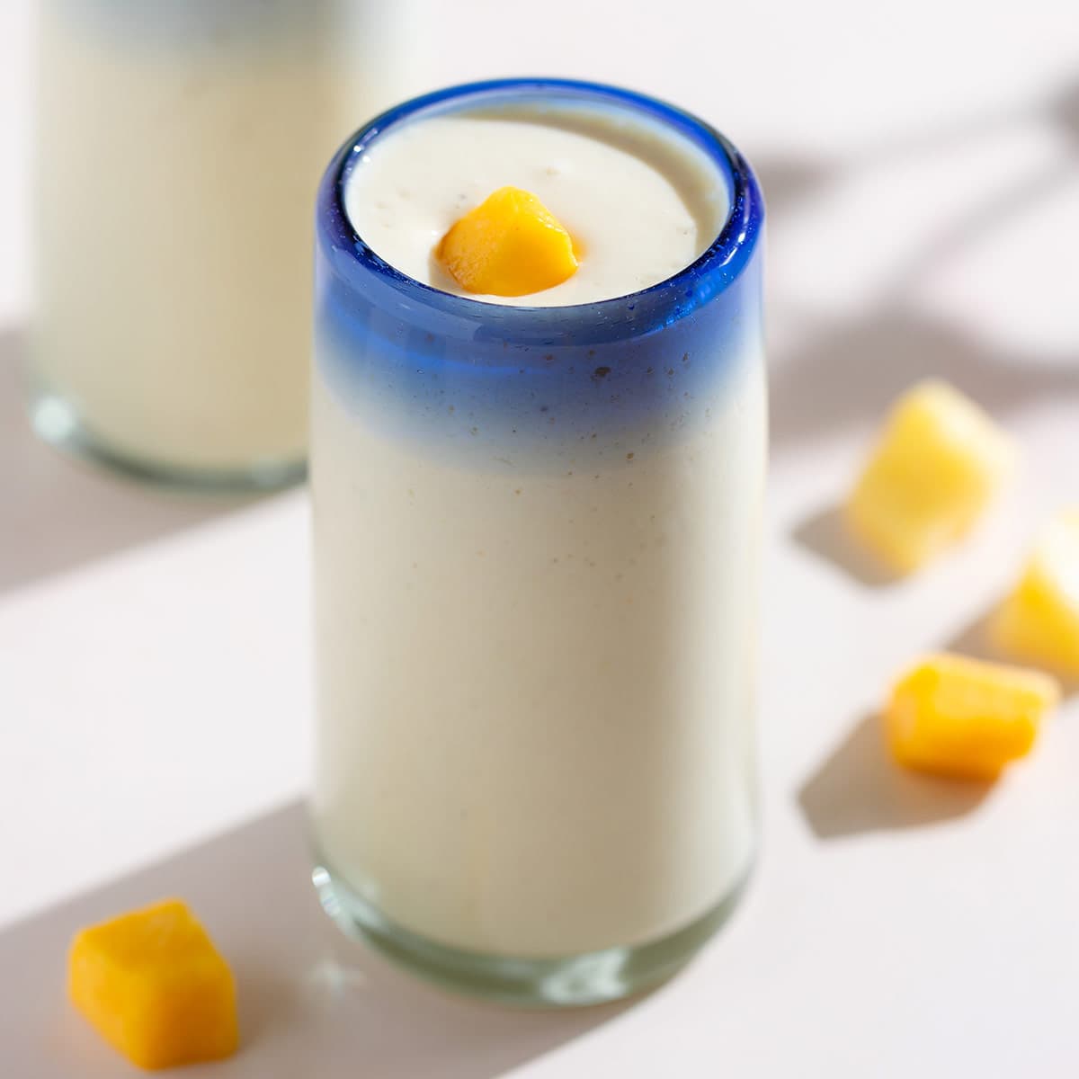 This tropical Mango Pineapple Smoothie is creamy, easy to make, and so delicious! It comes together in minutes and it can be served as a light refreshing snack or for breakfast with protein powder. #mangopineapplesmoothie thehealthfulideas.com/mango-pineappl…