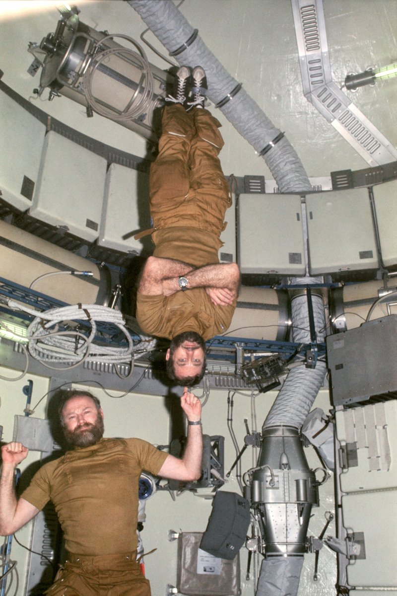 Jerry Carr and Bill Pogue fool around in the upper dome of the Skylab space station. NASA image. #Skylab #NASA