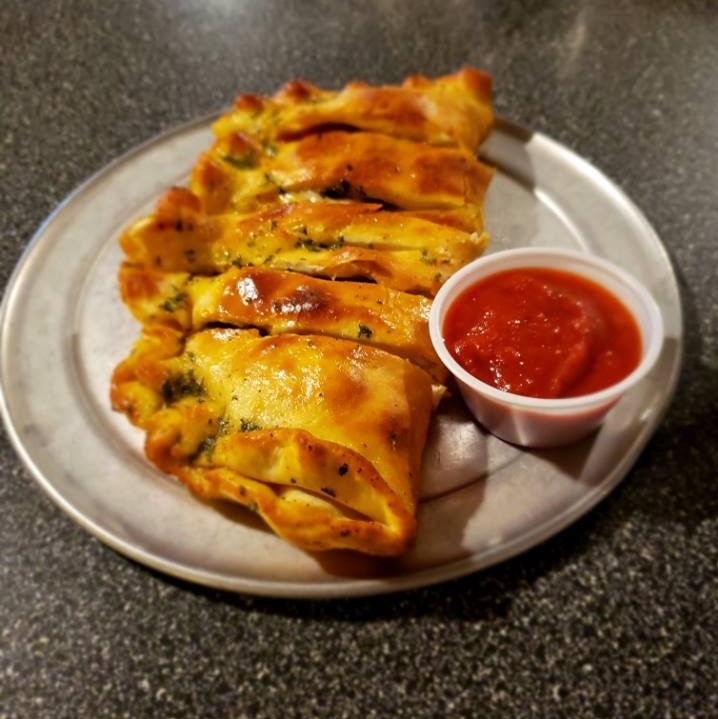 Luigi's calzones are bigger than your head and filled with deliciousness.

#pizza #andover #wichita #kansas #cheese #pepperoni #sausage #dinner #pepper #chicken #ham #dough #tomatosauce #luigi #pork #onion #calzone #salad #cheesecake #cookies #pasta #spaghetti #pizza4acause