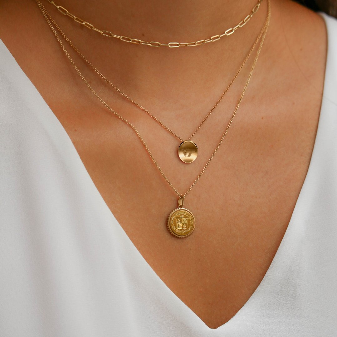 hokiegear's tweet photo. Graduation is right around the corner. Show your #Hokie pride than with a piece from women-owned @kylecavanjewelry Virginia Tech Collection. For a limited time receive 20% off 14k Gold with code VTGOLD through 4/30. Shop now at: https://t.co/KKX2zCr3ID https://t.co/UKPvQUCbnR