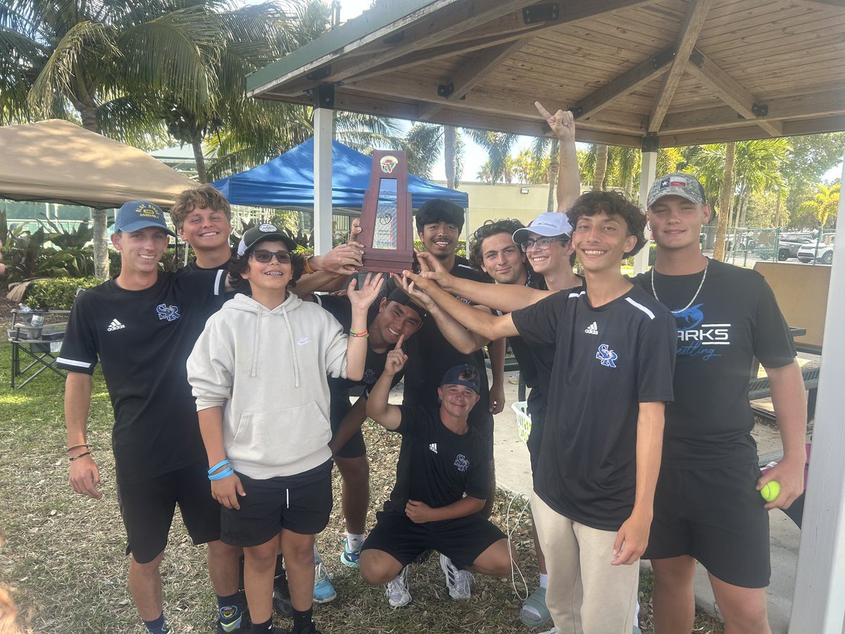 Boys Tennis team showing off their hard fought District Championship trophy. They have a home Regional match on Tuesday against East River. @SRHS_SHARKS @SRHS_Sport