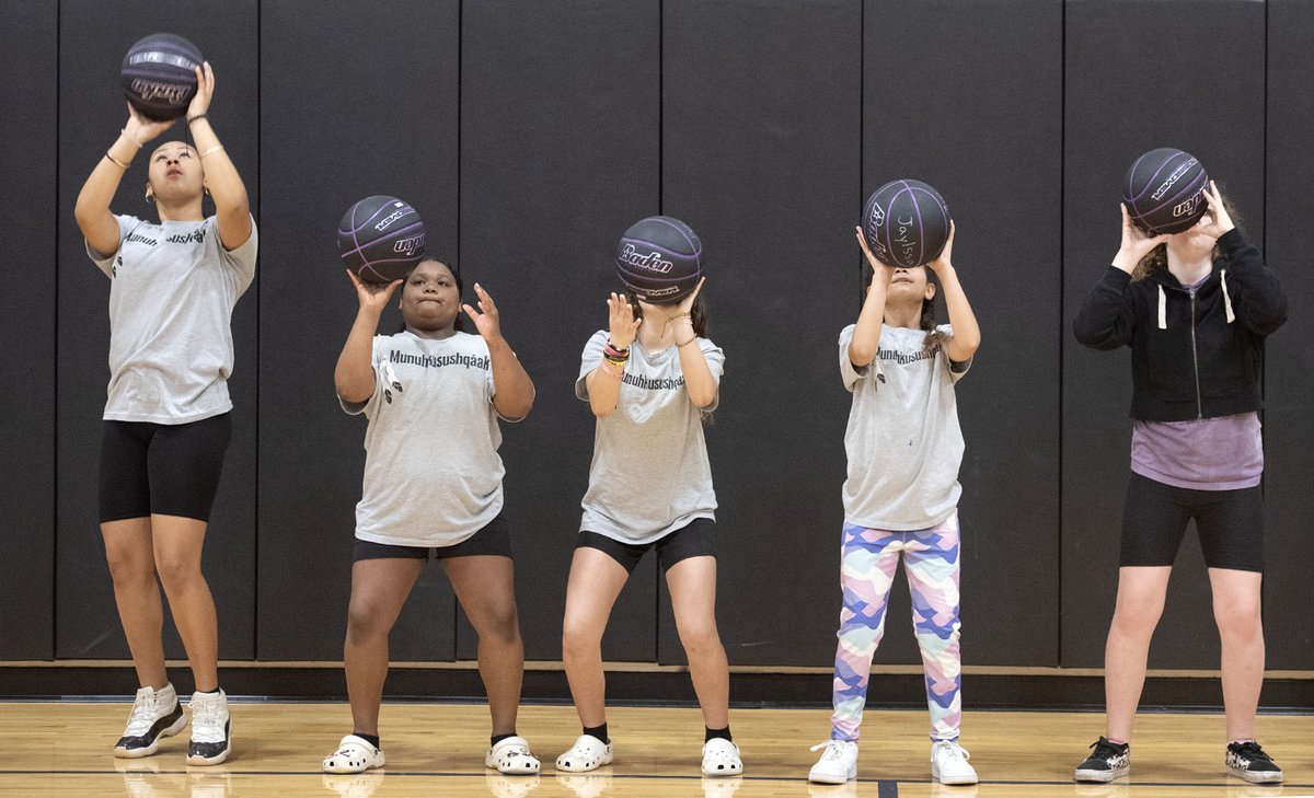 Girls in the GLAM, Global Local Athletic Movement, basketball clinic practice shooting techniques under the direction of WNBA player Ryneldi Becenti at the Mashpee Wampanoag Tribal Government Center. @capecodtimes