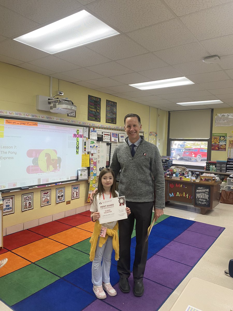 Dr. Enderle presented this 2nd grade student in Mrs. McAuliffe’s class with a Perseverance Award. #d123