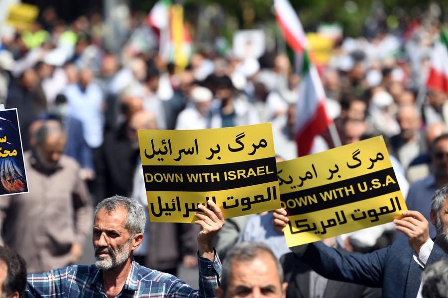 Iranians stage nationwide rallies to express support for last week's retaliatory strikes against Israel xhtxs.cn/SMV